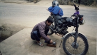 Videonauts backpacking Vietnam Honda Win mechanic