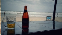 Videonauts backpacking Vietnam beer on the beach